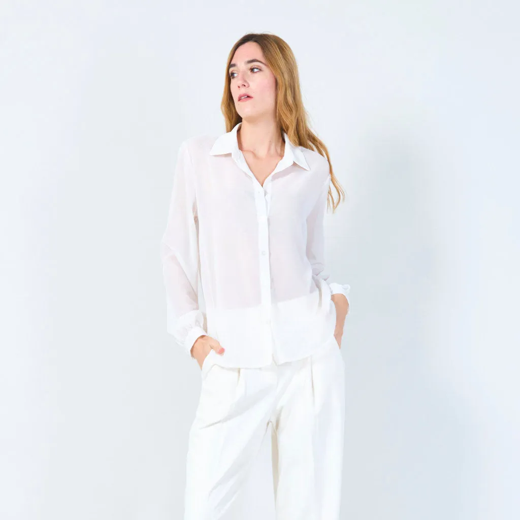 Sheer button-up blouse with polka dot accents wholesale