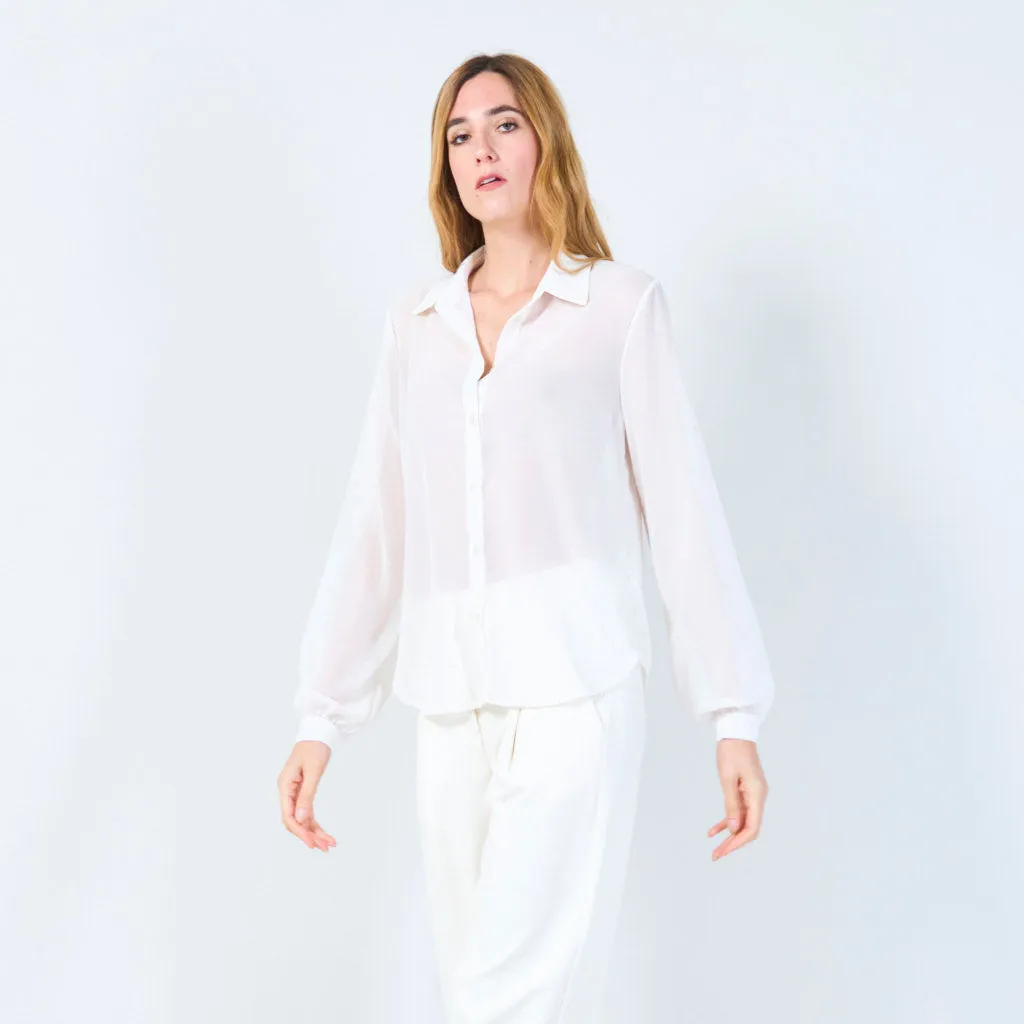 Sheer button-up blouse with polka dot accents wholesale